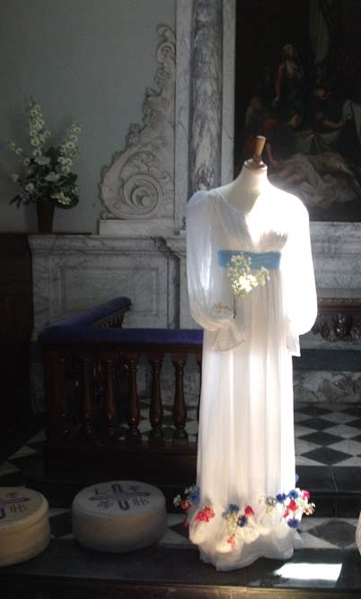 A dress of the period, in the House's Chapel